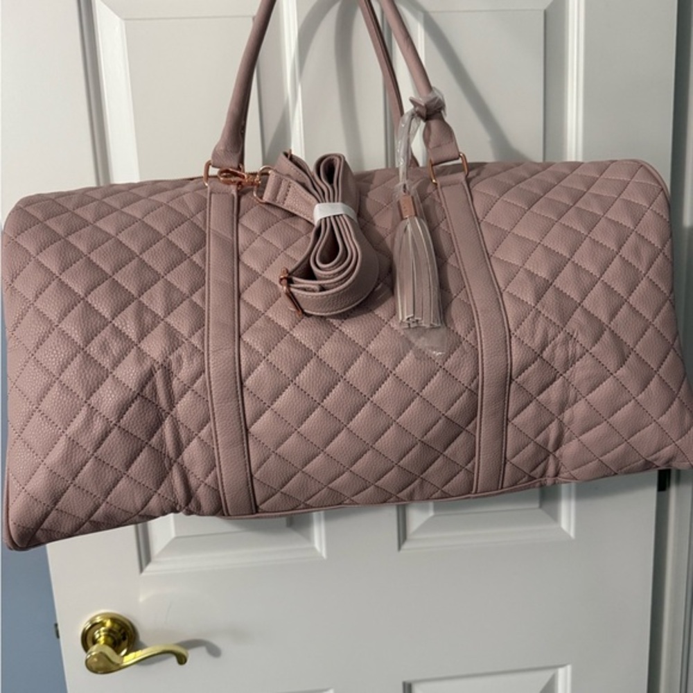 Pink Quilted Travel Bag with Structured Design